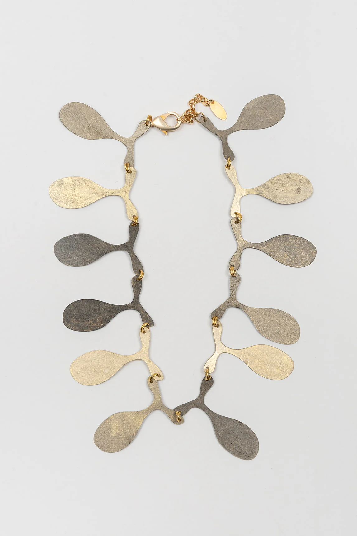 FL Private Collection golden teardrop necklace