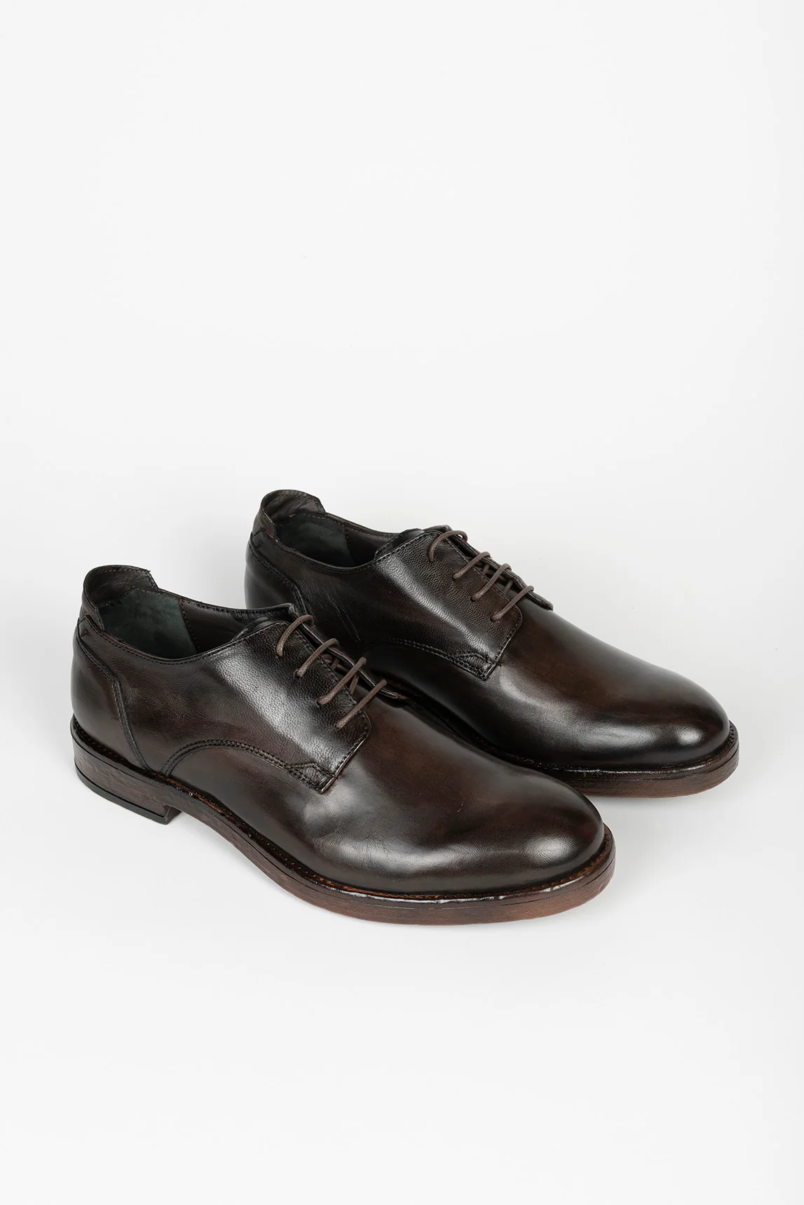 Dark brown leather shoe
